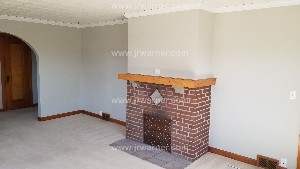 Mantel of a NON
        working fireplace
